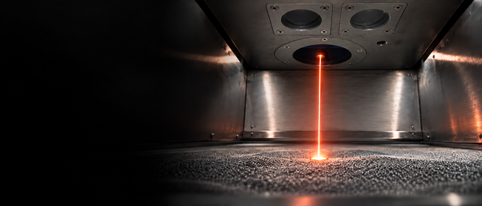 Single red laser emitted through the main optical window of the X1 metal 3D printer